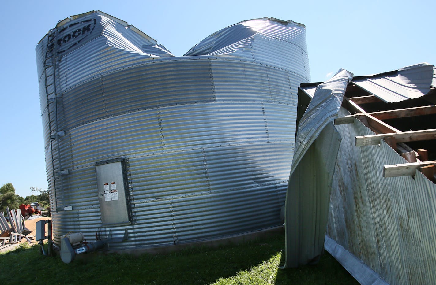 One grain bin was destoyed, another damaged and the roof of a nearby shed peeled back on the farm of Gary and Robin Rasset in Hollywood Township, where an EF-1 tornado with 105 mph winds touched down Saturday, July 18, 2015, near Watertown, MN.](DAVID JOLES/STARTRIBUNE)djoles@startribune.com High winds, heavy rain and a tornado whipped through the Twin Cities late Friday night and early Saturday morning, bringing down trees and knocking out power to thousands.