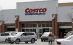 FILE - In this April 11, 2019, file photo people shop at a Costco store in Homestead, Pa. The Gap Inc. reports financial results Thursday, May 30, 201