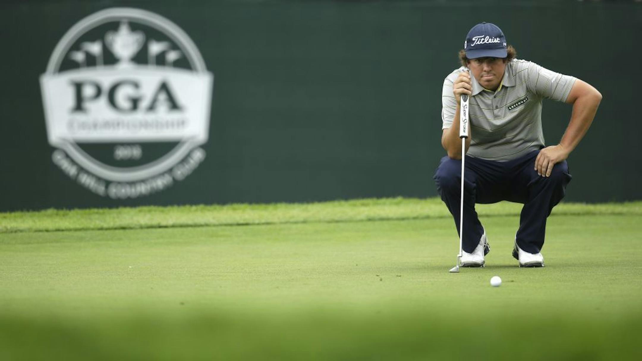 Jason Dufner lines up a putt on the eighth hole during the second round of the PGA Championship golf tournament at Oak Hill Country Club, Friday, Aug. 9, 2013, in Pittsford, N.Y.