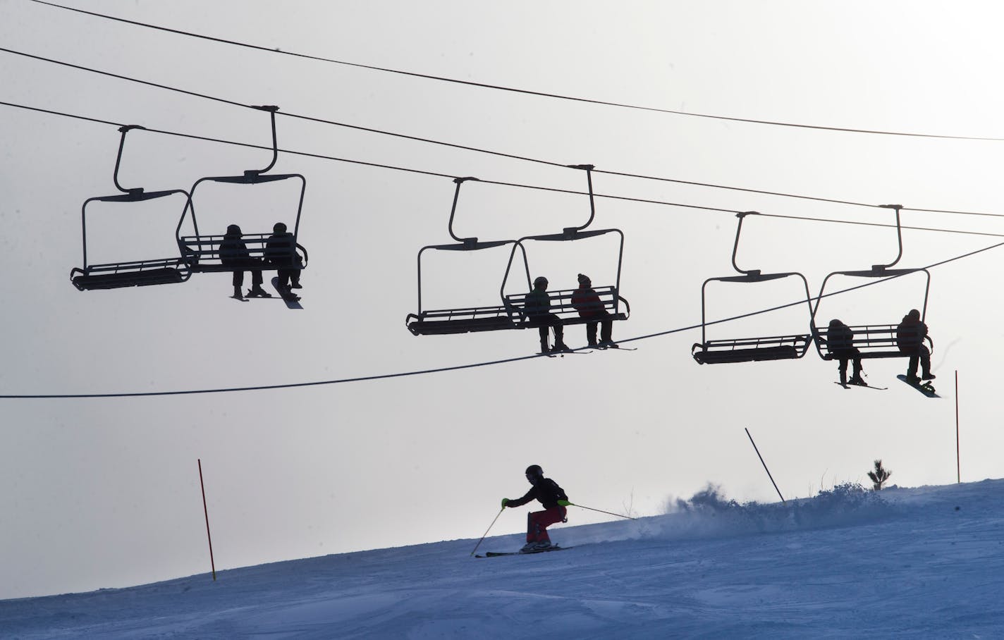 High School skiers from Eastview, Apple Valley and Eagan High School practiced on a course at Buck Hill last season. Tuesday's snow didn't put a damper on section championship races there.