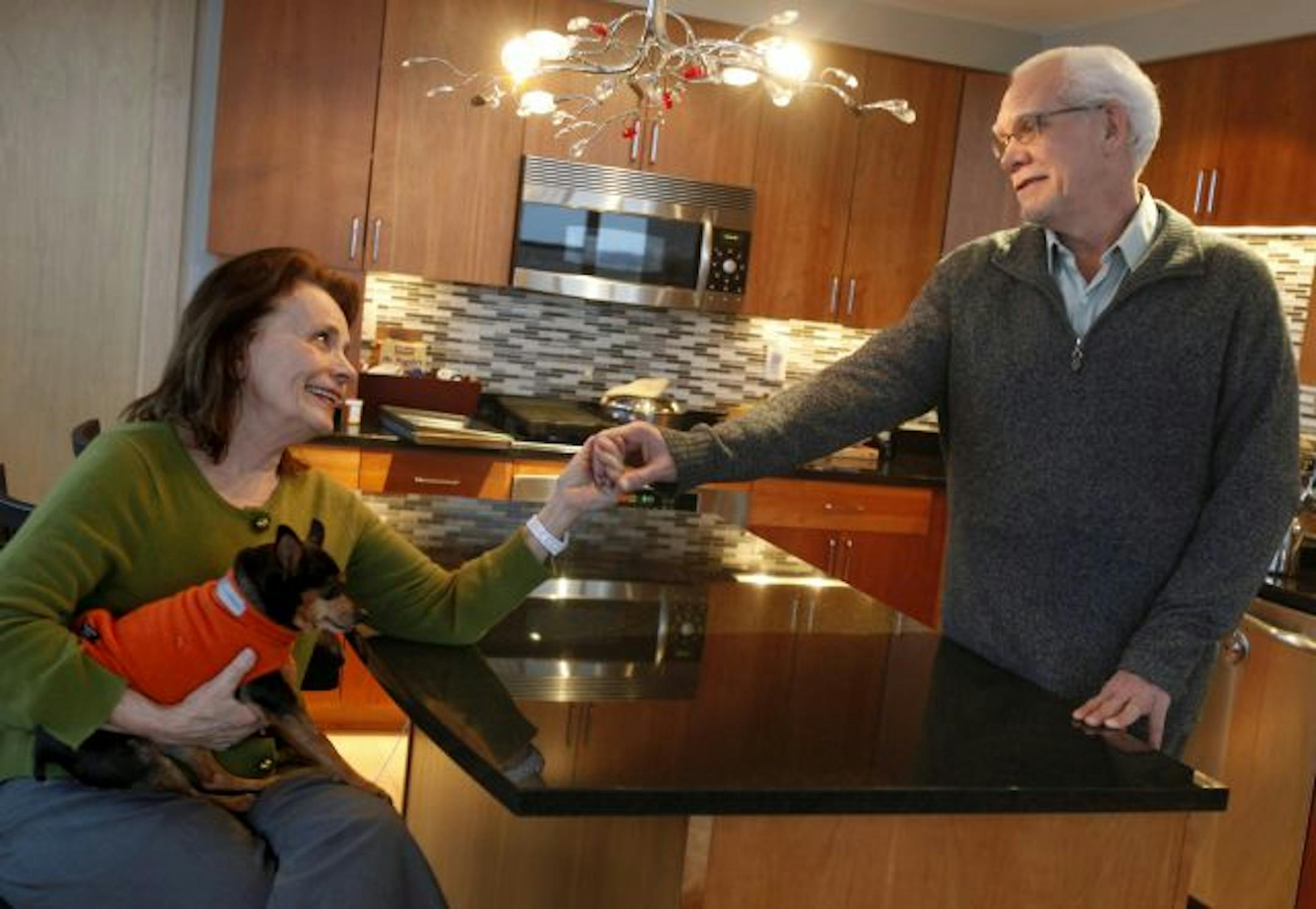Paul Burnett and Sue Salmela in the kitchen of their Minneapolis, MN condo.