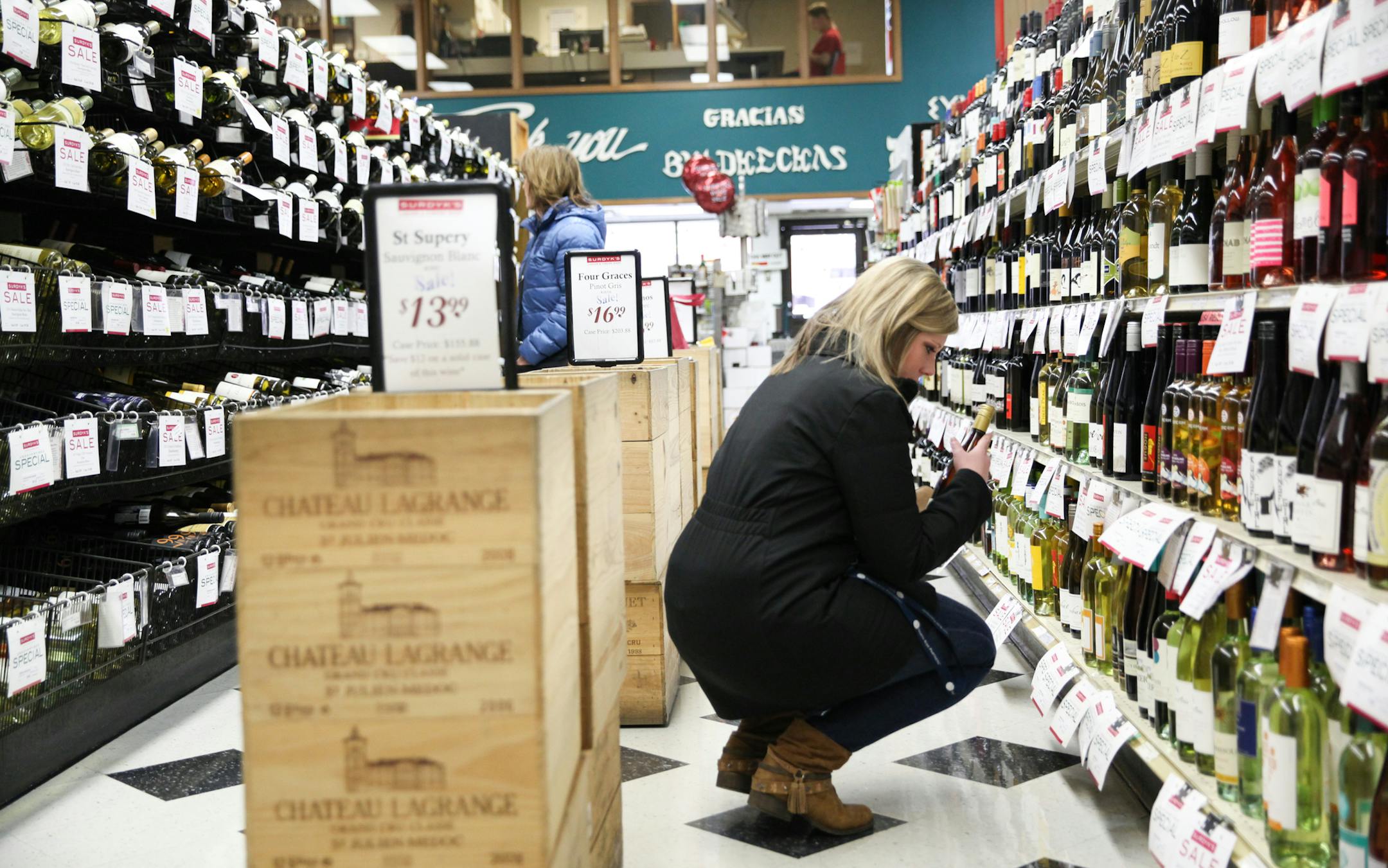 Sadie Frauendienst, 26, comes to shop in the Surdyk's liquor store on Sunday. March 12, 2017. ] XAVIER WANG ¥ xavier.wang@startribune.com