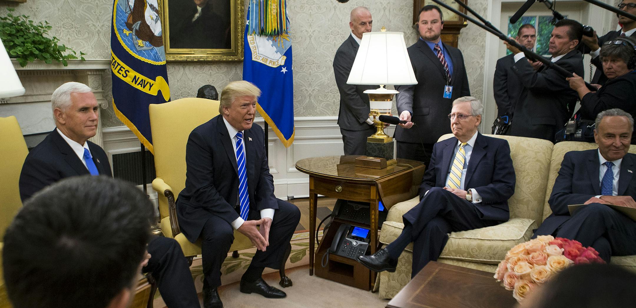 From left: Vice President Mike Pence and President Donald Trump meet with congressional leadership, including Senate Majority Leader Mitch McConnell (R-Ky.) and Senate Minority Leader Chuck Schumer (D-N.Y.) in the Oval Office of the White House, in Washington, Sept. 6, 2017. Republican congressional leaders crammed onto couches in the Oval Office froze in mid-smile on Wednesday afternoon when they realized President Trump was bypassing them to cut a short-term spending and debt ceiling deal with