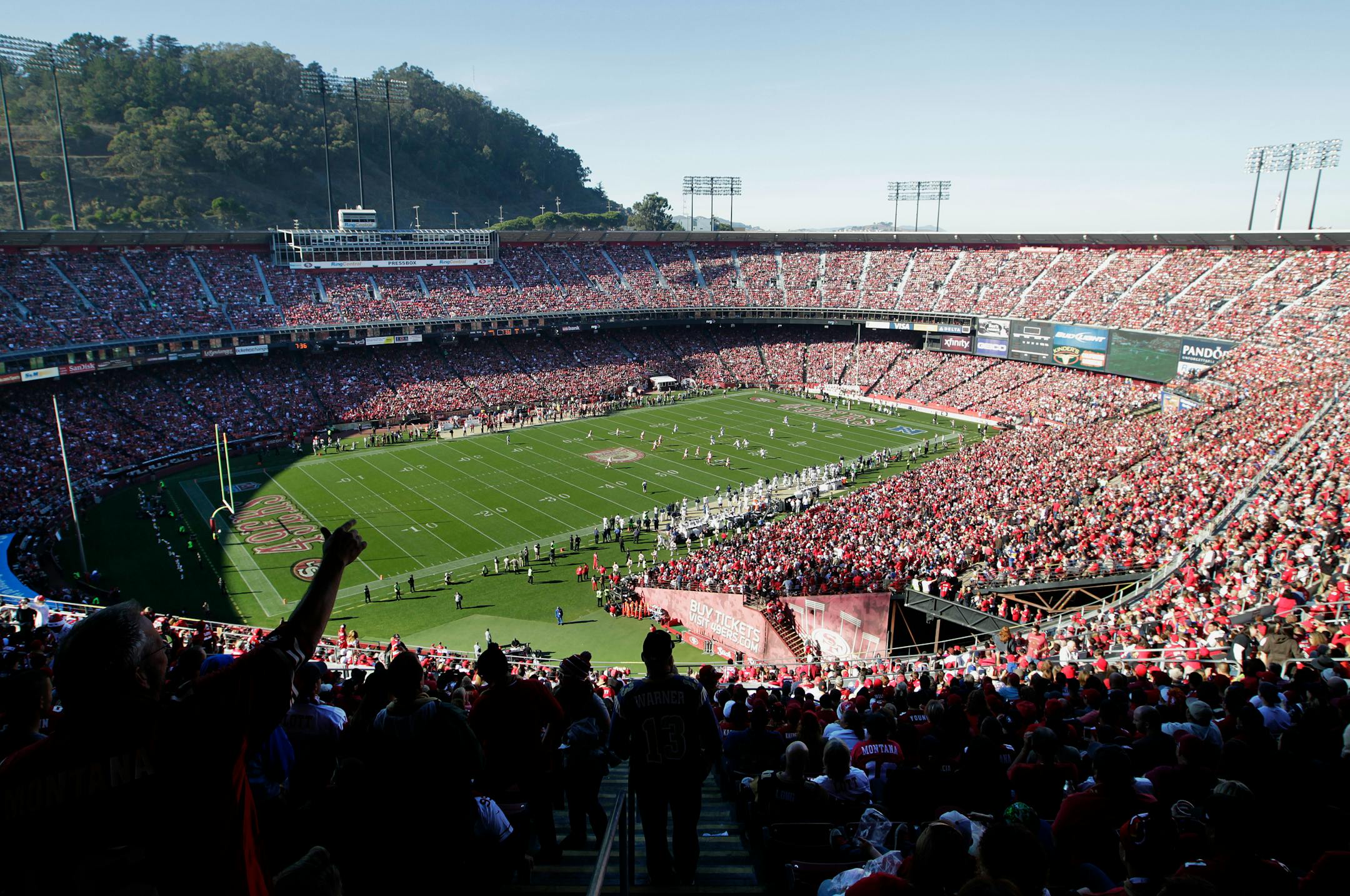 Fans at Candlestick Park watch during the first quarter of an NFL football game between the San Francisco 49ers and the St. Louis Rams in San Francisco, Sunday, Dec. 1, 2013. (AP Photo/Tony Avelar)