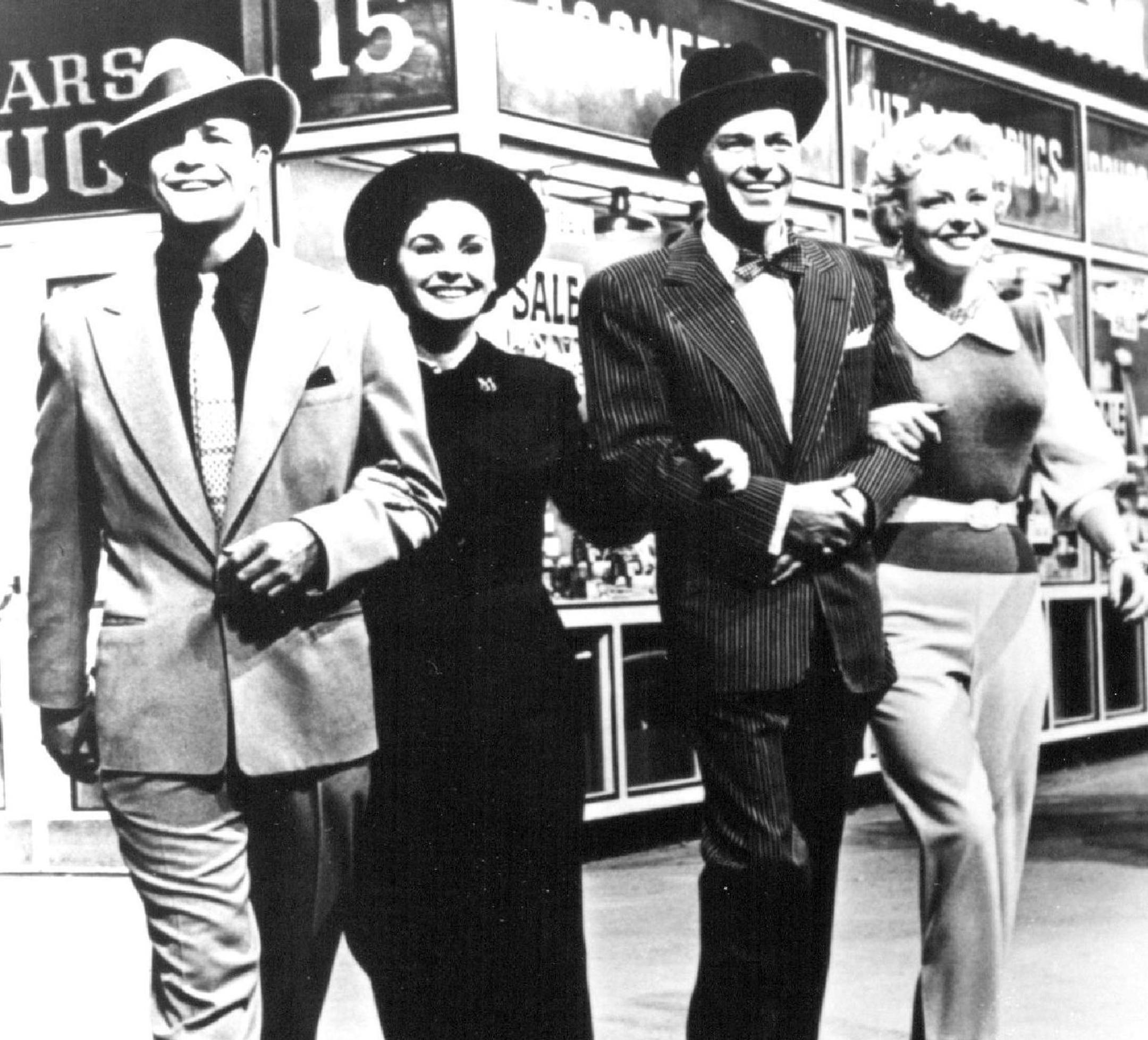 (Left, L-R) Marlon Brando, Jean Simmons, Frank Sinatra and Vivian Blaine star in the 1955 musical GUYS AND DOLLS — A special AMERICAN MOVIE CLASSICS Network Presentation. (RIGHT) In order to win a bet, Sky Masterson (Marlon Brando) tries to convince Sarah Brown (Jean Simmons) to accompany him to Havana. American Movies Classic