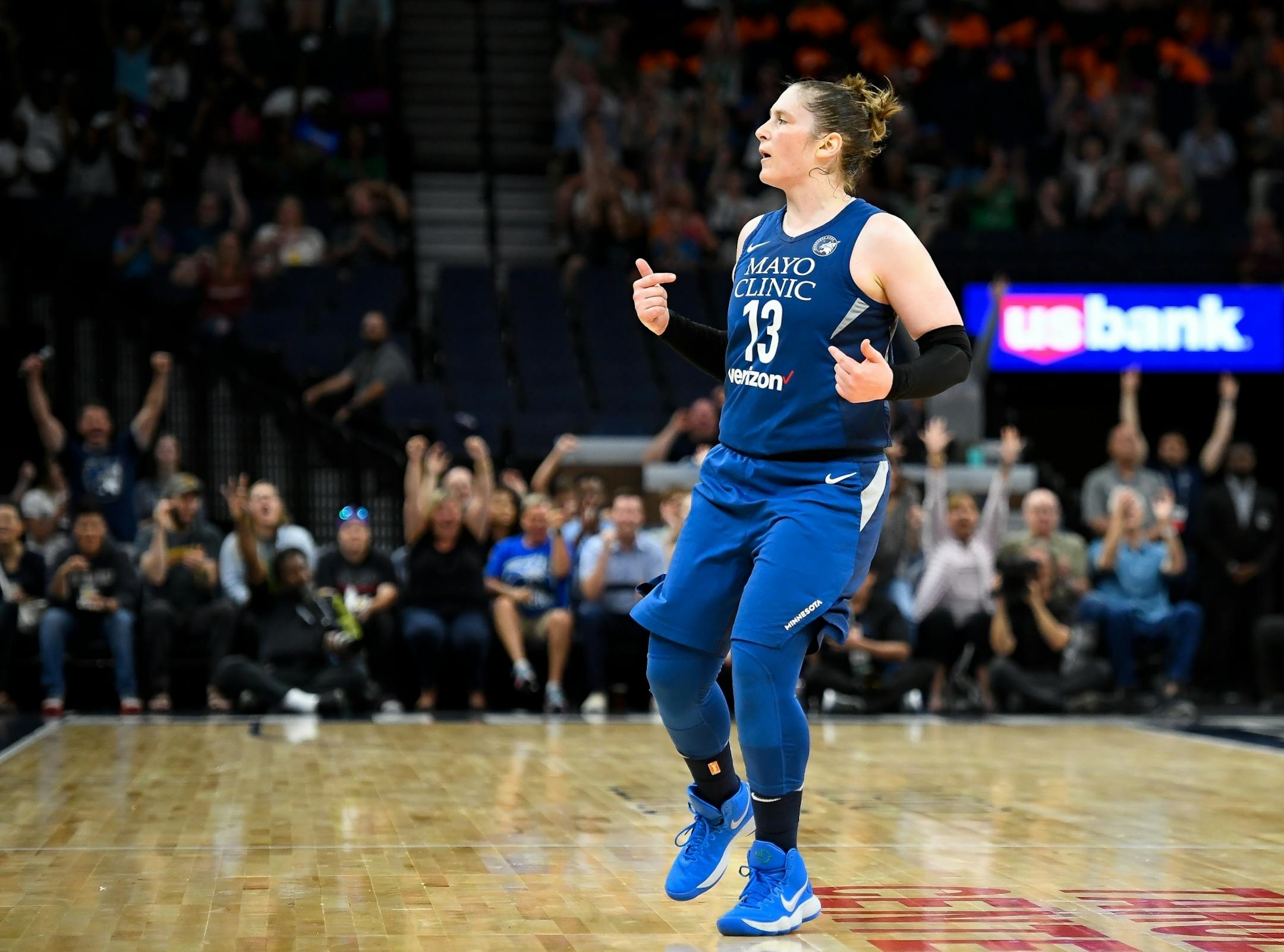 Minnesota Lynx guard Lindsay Whalen (13) reacted after hitting a 3-pointer against the Los Angeles Sparks in the second half.