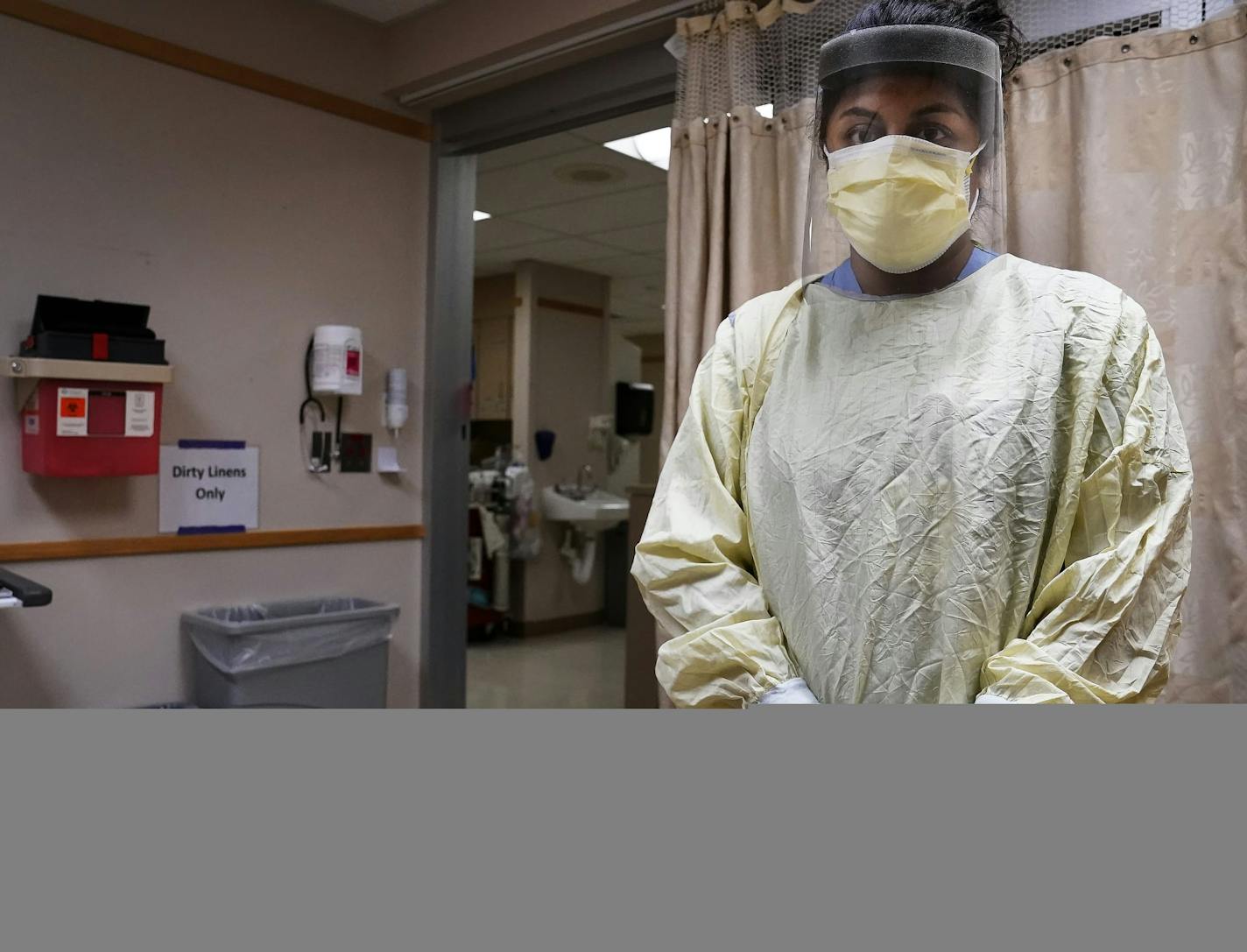 HCMC nurse practitioner Sheyanga Beecher posed for a portrait in her PPE Tuesday at HCMC in Minneapolis. ] DAVID JOLES • david.joles@startribune.com MD at our Viral Screening Clinic **Sheyanga Beecher,cq