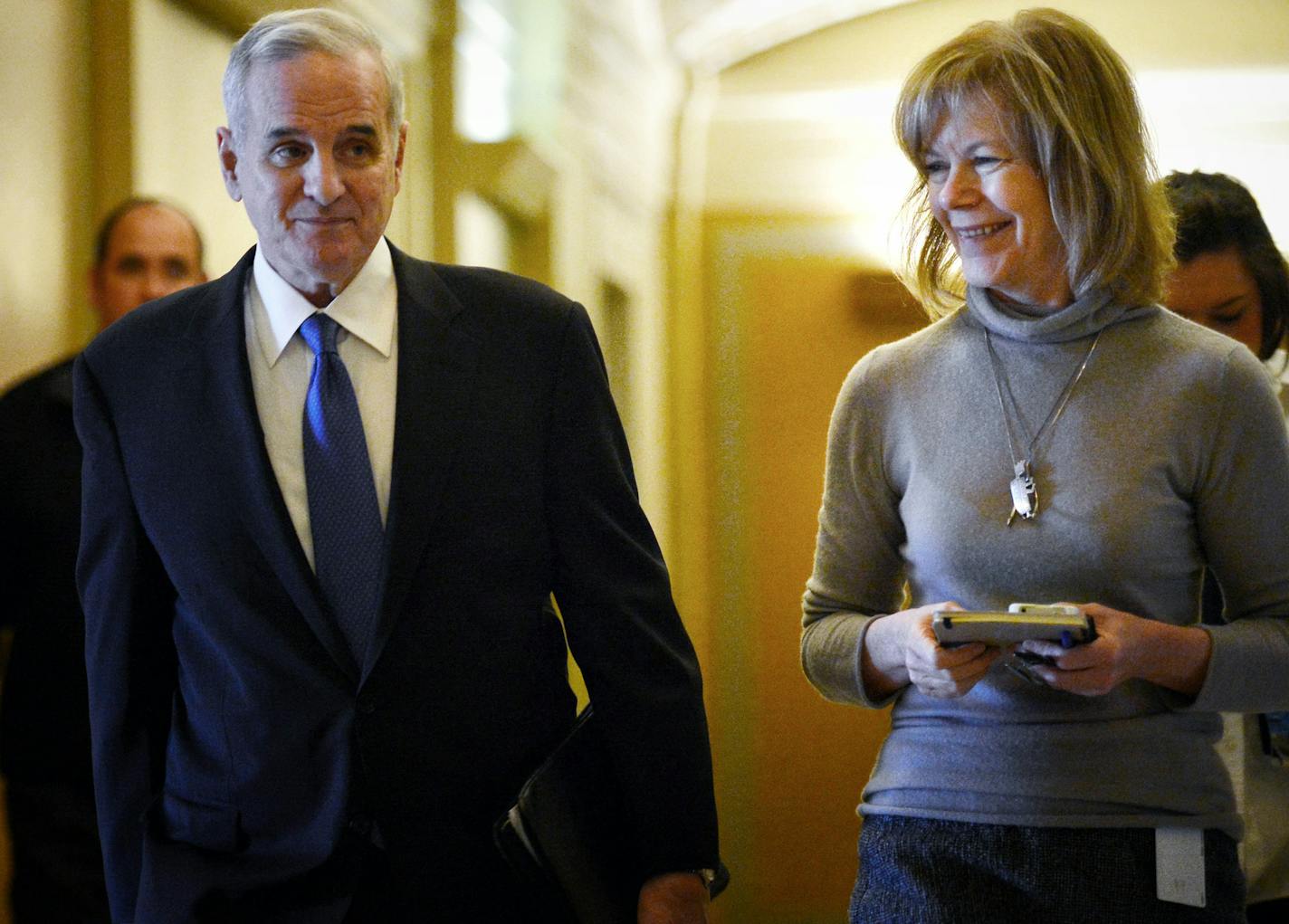 Governor Dayton's chief of Staff Tina Smith, right, accompanied Governor Mark Dayton who spoke to reporters about the State of Minnesota February Budget Forecast on Thursday, February 28, 2013.