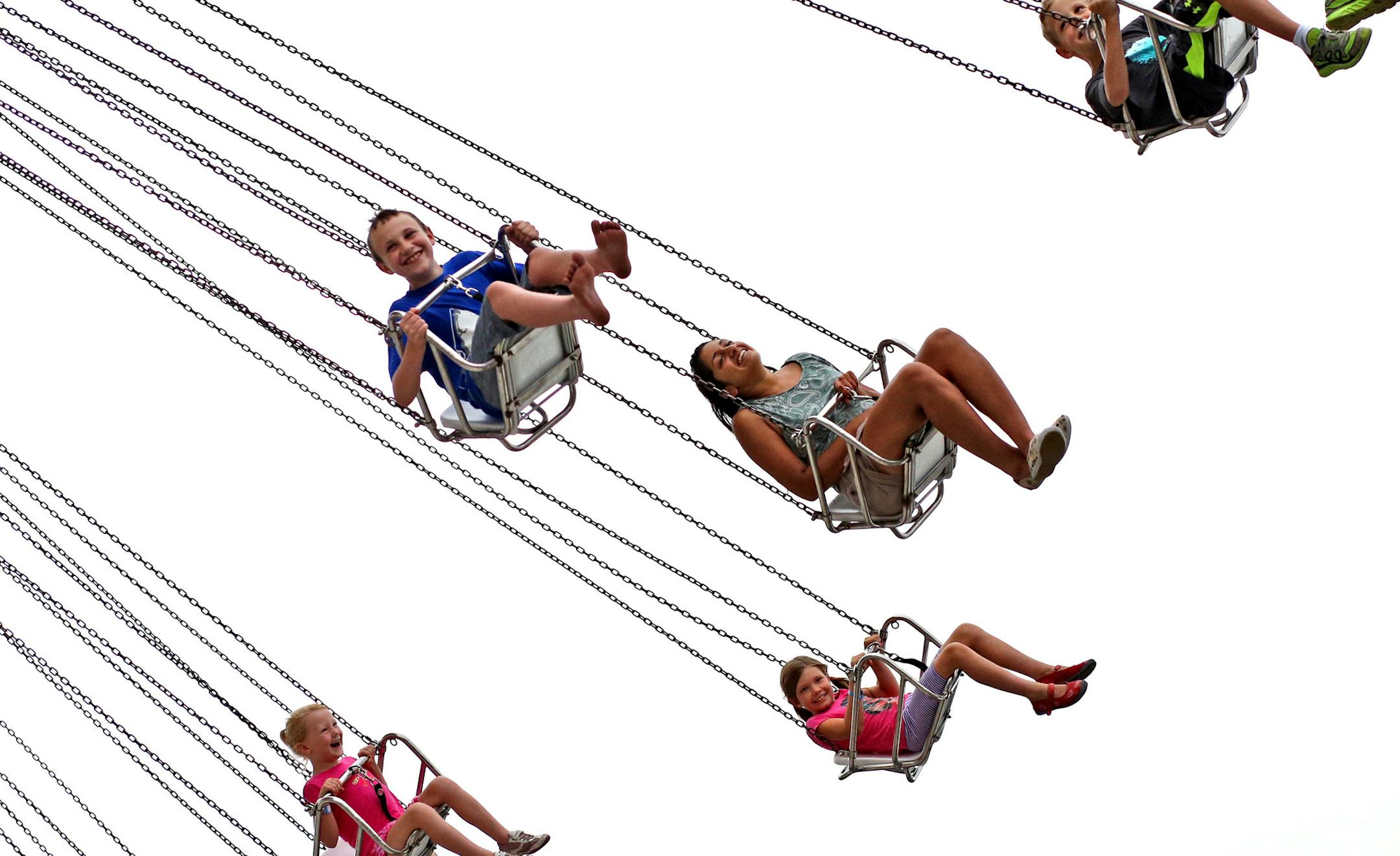 Nothing like a fair ride to put a smile on a kids face, here, kids on the Wave Swinger were having a good time at the Minnesota State Fair. ] BRIAN PETERSON ‚Ä¢ brian.peterson@startribune.com Falcon Heights, MN 08/21/14