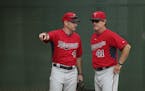 Twins pitching coach Neil Allen 941) and manager Paul Molitor (4) conferred in the bullpen Wednesday morning at Hammond Stadium.