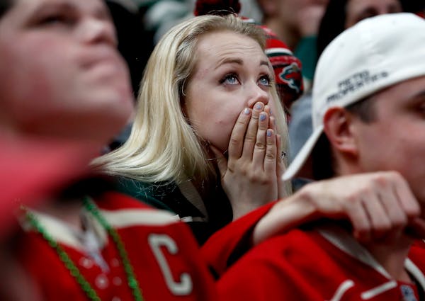 A Wild fan looked up at the scoreboard after a go ahead goal by St. Louis late in the third period. The Blues beat the Wild 2-1.