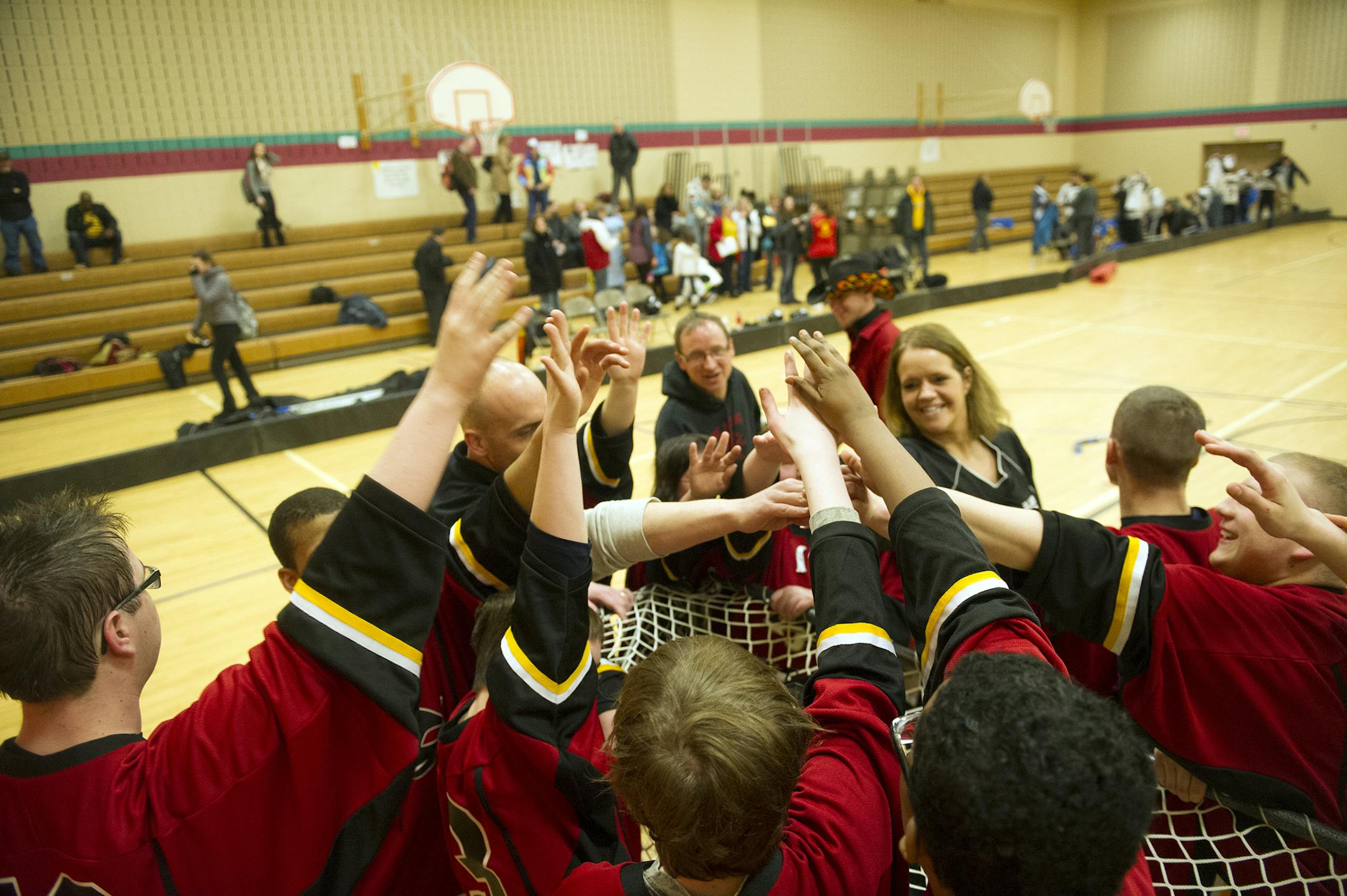 The Lakeville Blazing Cats celebrate a big win over Robbinsdale Wednesday night at Mcguire Middle School in Lakeville. ] (Matthew Hintz, 030414, Lakeville)