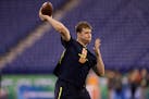 Minnesota quarterback Mitch Leidner runs a drill at the NFL football scouting combine Saturday, March 4, 2017, in Indianapolis. (AP Photo/David J. Phi