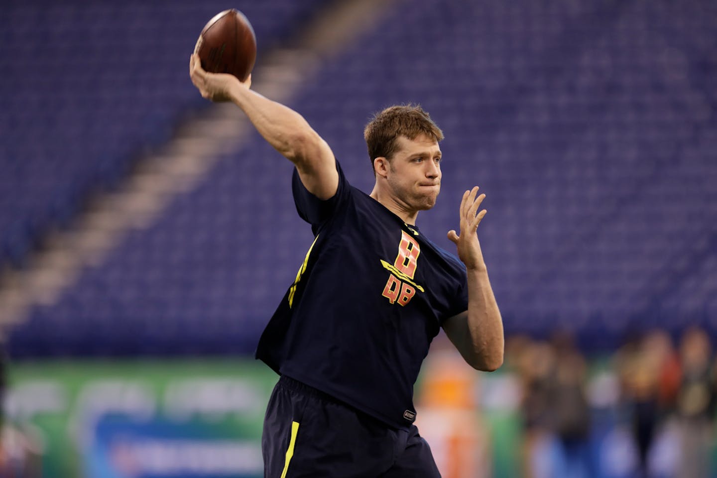 Minnesota quarterback Mitch Leidner runs a drill at the NFL football scouting combine Saturday, March 4, 2017, in Indianapolis. (AP Photo/David J. Phillip)