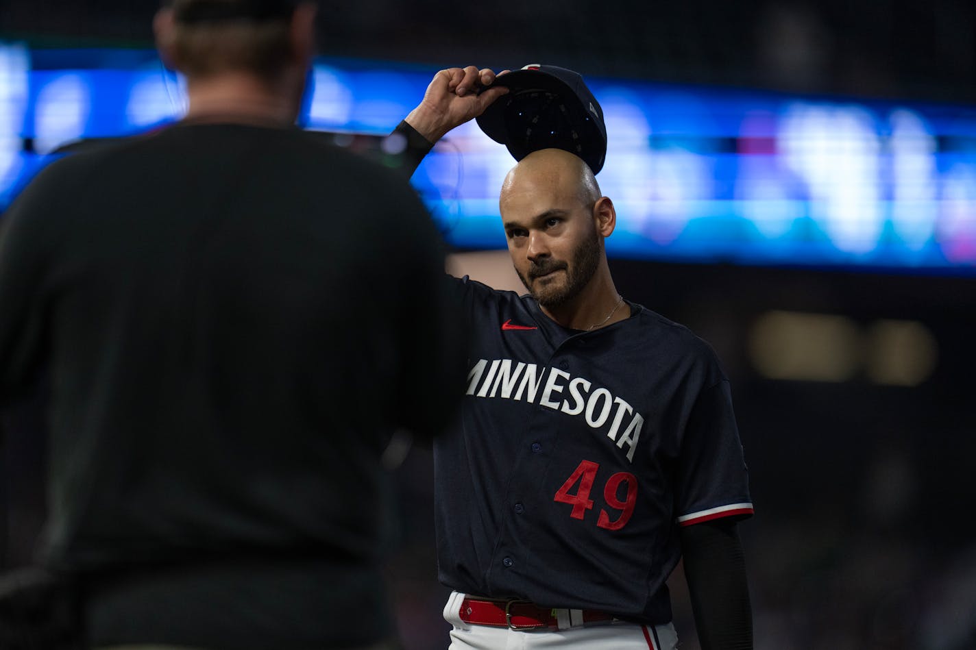 Minnesota Twins relief pitcher Pablo López tipped his cap as he walked off the mound in the 8th inning Tuesday April 11,2023 in Minneapolis, Minn.] JERRY HOLT • jerry.holt@startribune.come