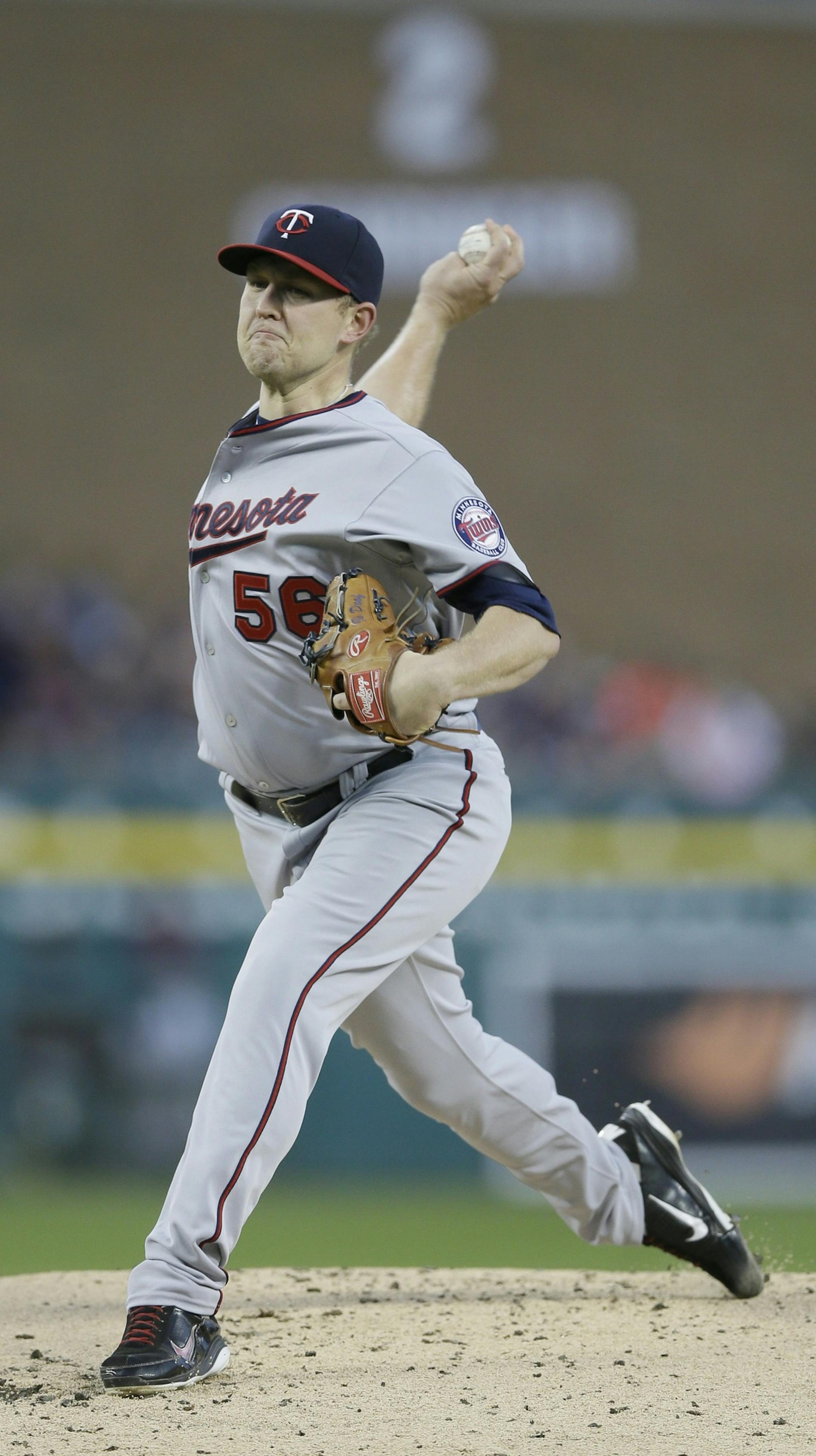 Minnesota Twins starting pitcher Tyler Duffey throws during the first inning of a baseball game against the Detroit Tigers, Saturday, Sept. 26, 2015 in Detroit. (AP Photo/Carlos Osorio)