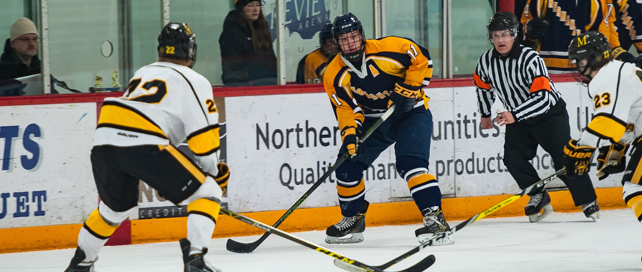 Hermantown scoring leader and Mr. Hockey finalist Ryan Sandelin (11) with the puck. Sandelin is the son Minnesota Duluth coach Scott Sandelin. Photo by Matt Moses, SportsEngine