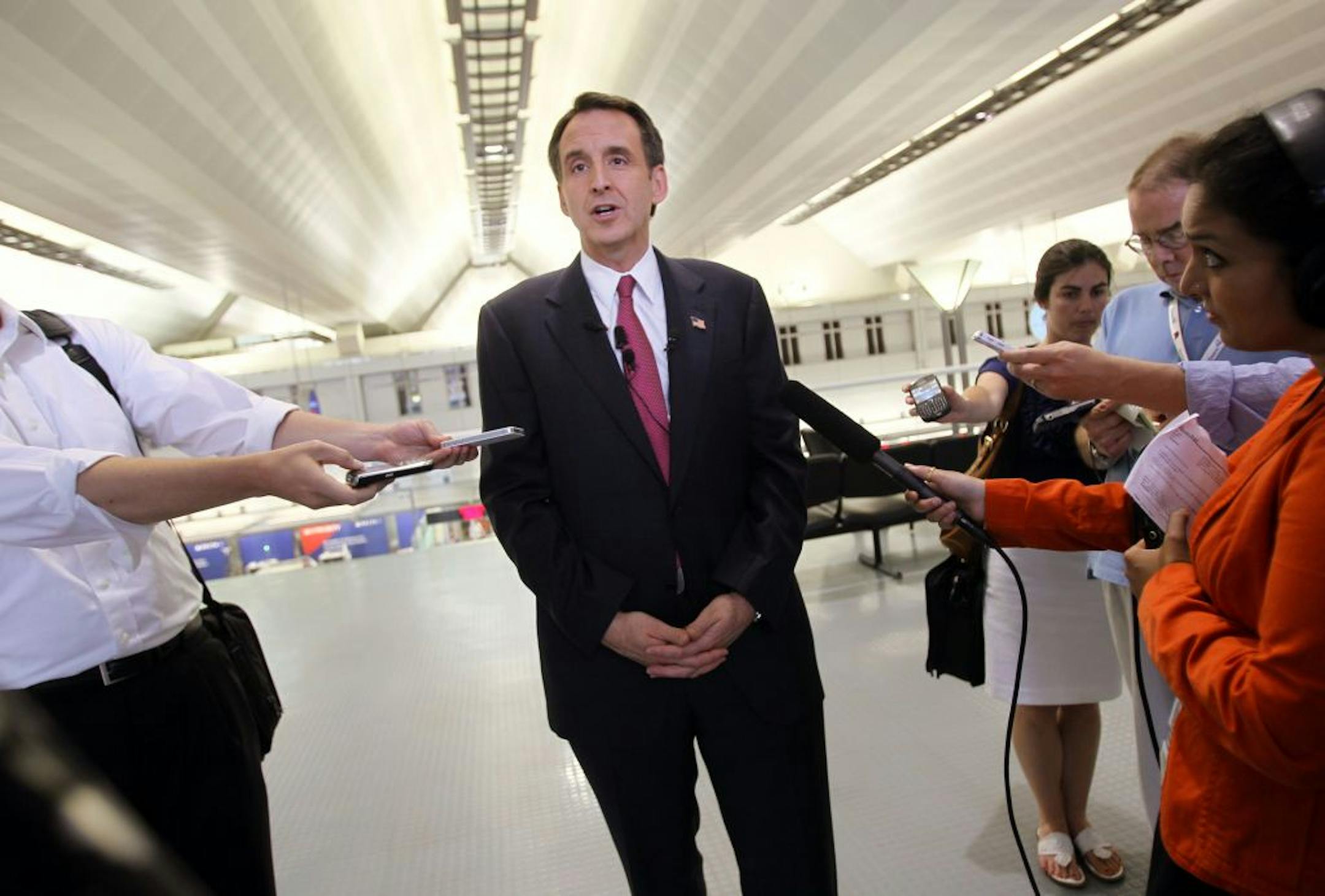 Former Governor Tim Pawlenty spoke to the media at the Minneapolis/St. Paul International Airport after arriving from Florida on the state budget crisis and his support for the republicans Thursday June, 30, 2011 in Bloomington, Minn.