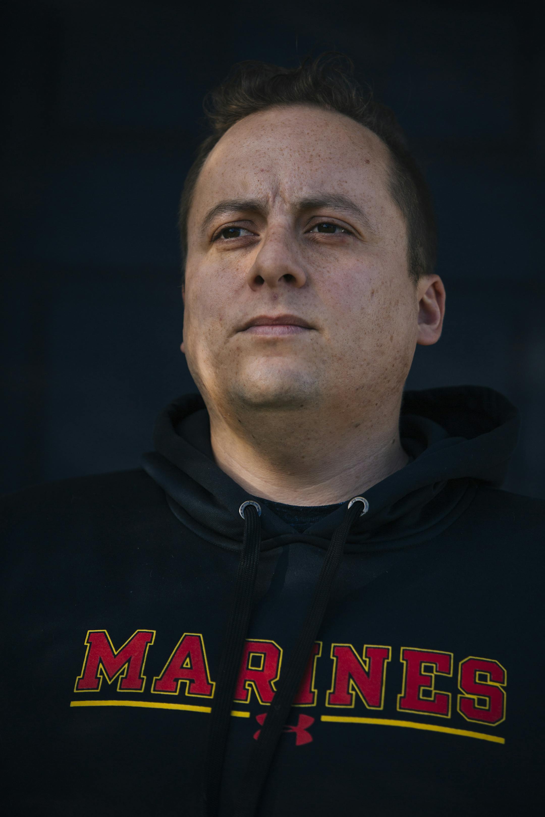 Ruben Sevilla, a former lance corporal, who keeps in touch with a small group of friends from the battalion, in Oswego, Ill., Oct. 1, 2020. He said he has drifted away from the larger group in part because of the partisan bickering. Toxic rhetoric and political polarization are doing what nothing else could: driving apart ex-Marines who had one another's backs through wars and the stresses of civilian life. (Taylor Glascock/The New York Times)