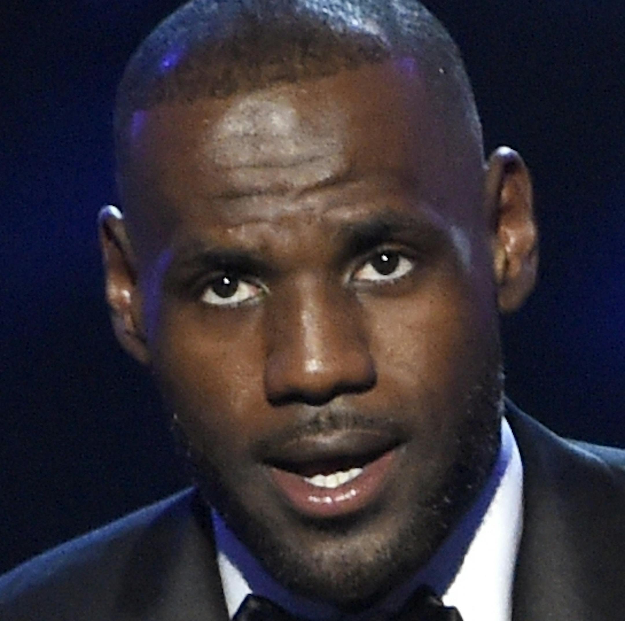 NBA basketball player LeBron James, of the Cleveland Cavaliers, accepts the award for best moment for his teamís 2016 NBA Finals Championship, at the ESPY Awards at the Microsoft Theater on Wednesday, July 13, 2016, in Los Angeles. (Photo by Chris Pizzello/Invision/AP)