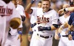 Minnesota Twins second baseman Brian Dozier (2) celebrates hitting a home run to win the game against the Baltimore Orioles at Target Field in Minneap