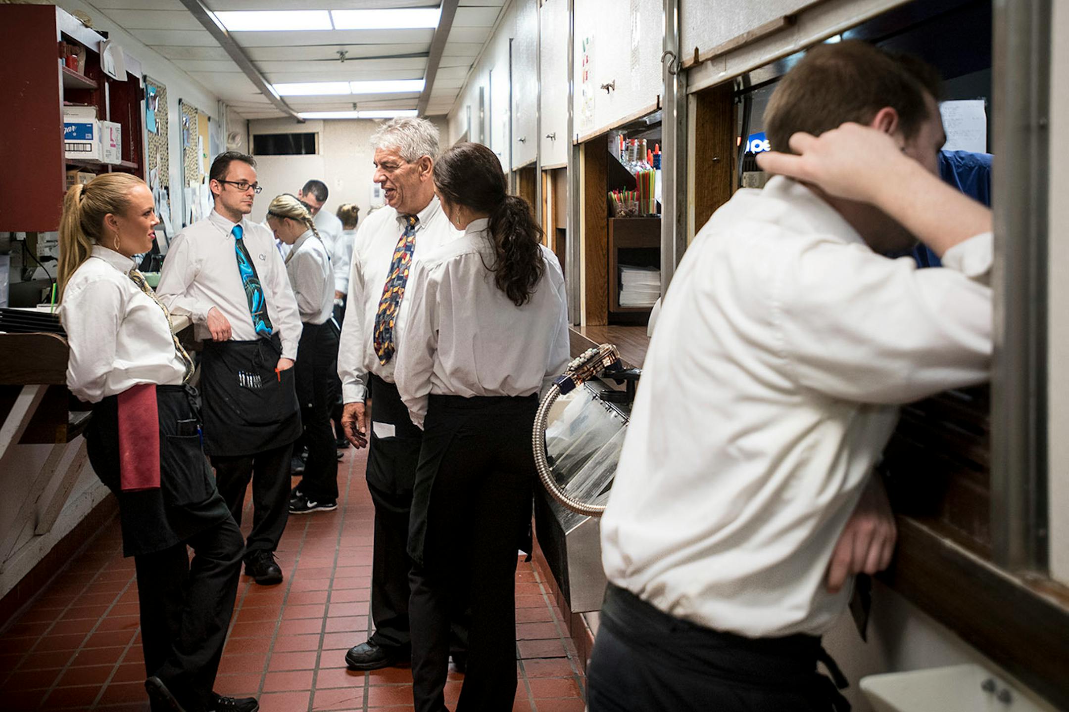 Servers took some downtime during the first act of Beauty and the Beast. Intermission is typically the busiest time of the work night, when servers serve desert and try to close out balances on their tables before the start of the second act.