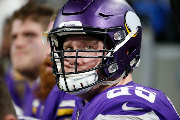 Minnesota Vikings center Pat Elflein sits on the bench during the second half of an NFL football game against the Chicago Bears, Sunday, Dec. 30, 2018