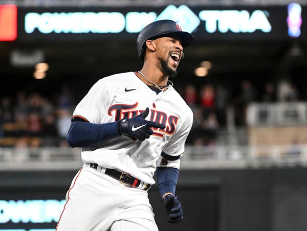 Minnesota Twins designated hitter Byron Buxton (25) celebrates his home run against the Oakland Athletics in the bottom of the fifth inning Friday, Ma