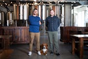 Co-founders Glenn Oslin and Alex Doering (with Oslin’s dog Garbanzo) at the future Brühaven taphouse, formerly Lakes & Legends, in Minneapolis' Lor