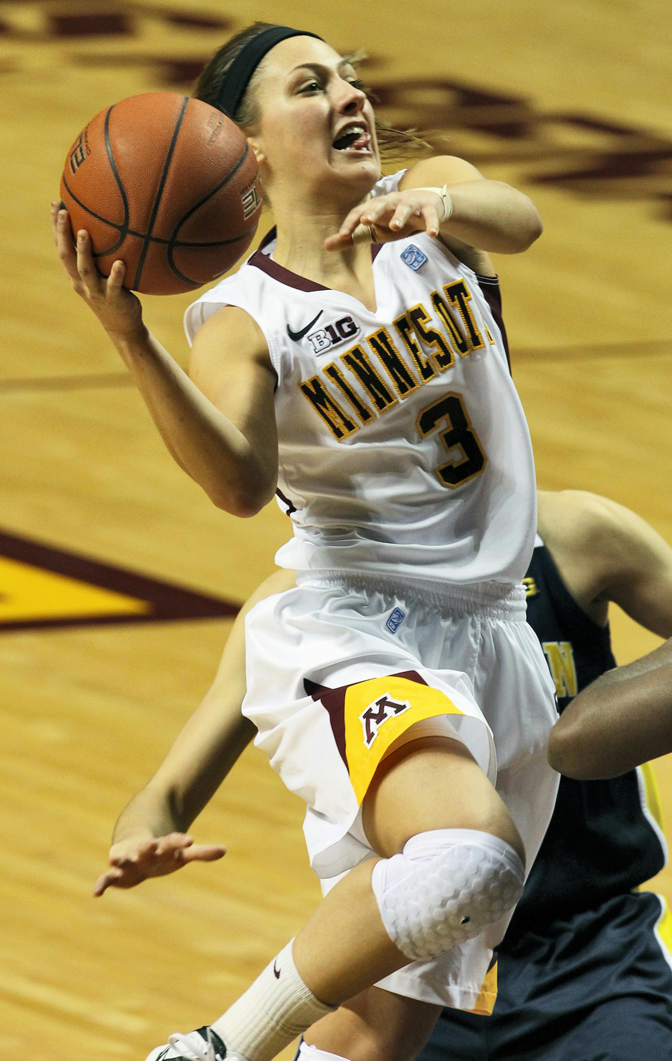 Minnesota Gopphers vs. Michigan Womens basketball. Minnesota won 82-67. Minnesota's Shayne Mullaney (3) drove to the basket for a layup. (MARLIN LEVISON/STARTRIBUNE(mlevison@startribune.com (cq -all names program.)