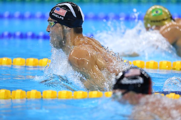 Michael Phelps of the U.S. competes in the men's 200-meter individual medley at the Olympic Aquatics Stadium during the 2016 Summer Olympics in Rio de