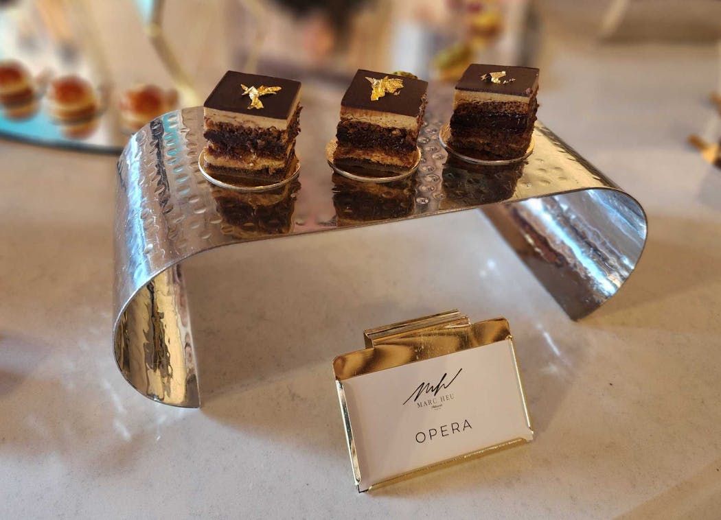 Marc Heu Patisserie desserts available courtside and in the Chairman Clubs: opera cake, vanilla choux, passionfruit raspberry tart, pistachio eclair, tropezienne