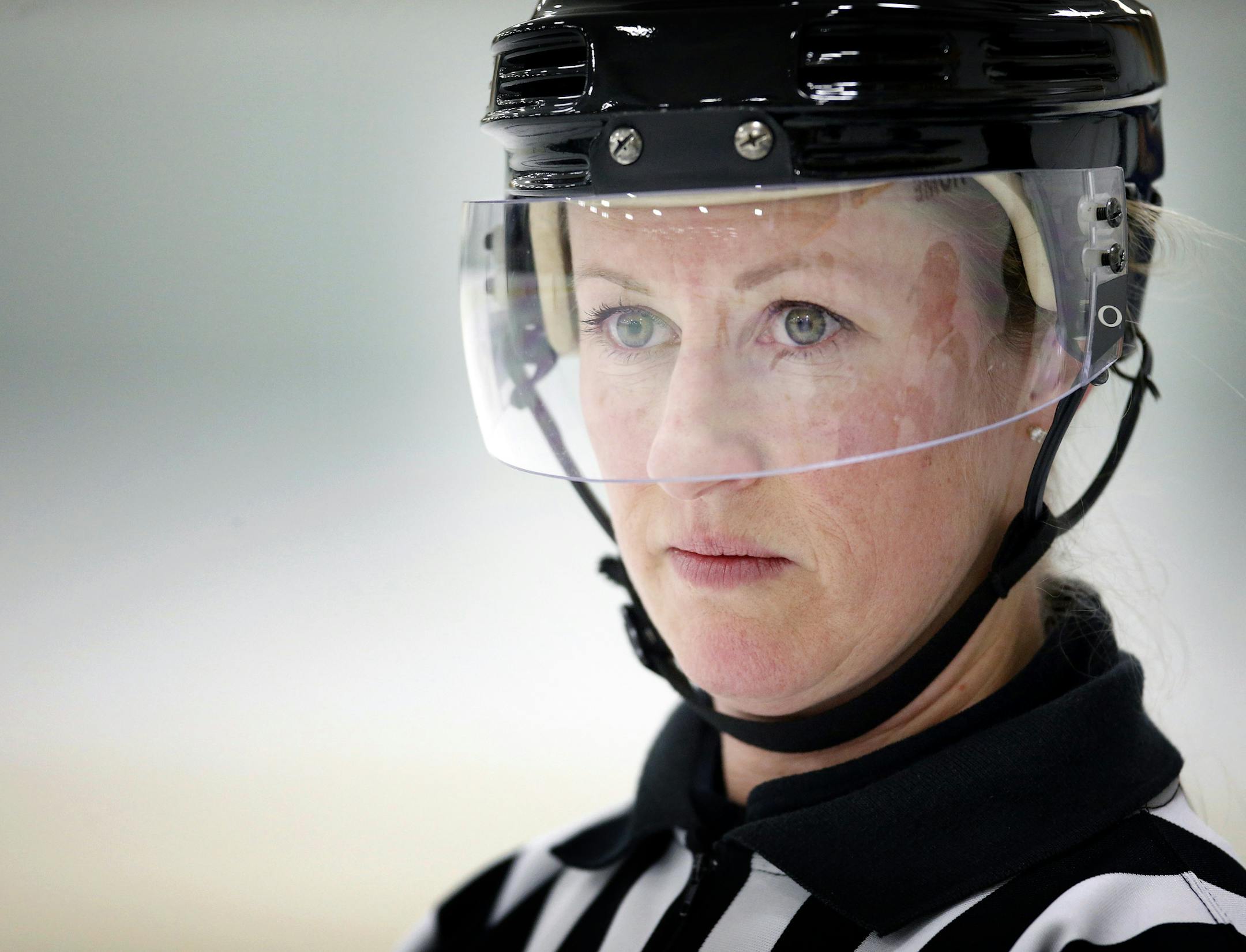 Hockey referee Alicia Hanrahan officiating a game at the Rosemount Community Center on Tuesday. Alicia Hanrahan of South St. Paul, will officiate the women hockey tournament at the Sochi Olympics. ] CARLOS GONZALEZ cgonzalez@startribune.com - January 28, 2013, Rosemount Community Center, The Minnesota connection at the Olympics includes more than just the 25 athletes. In addition, a number of others from our state will be involved in the Winter Games, in jobs that will put them on the ice, on th