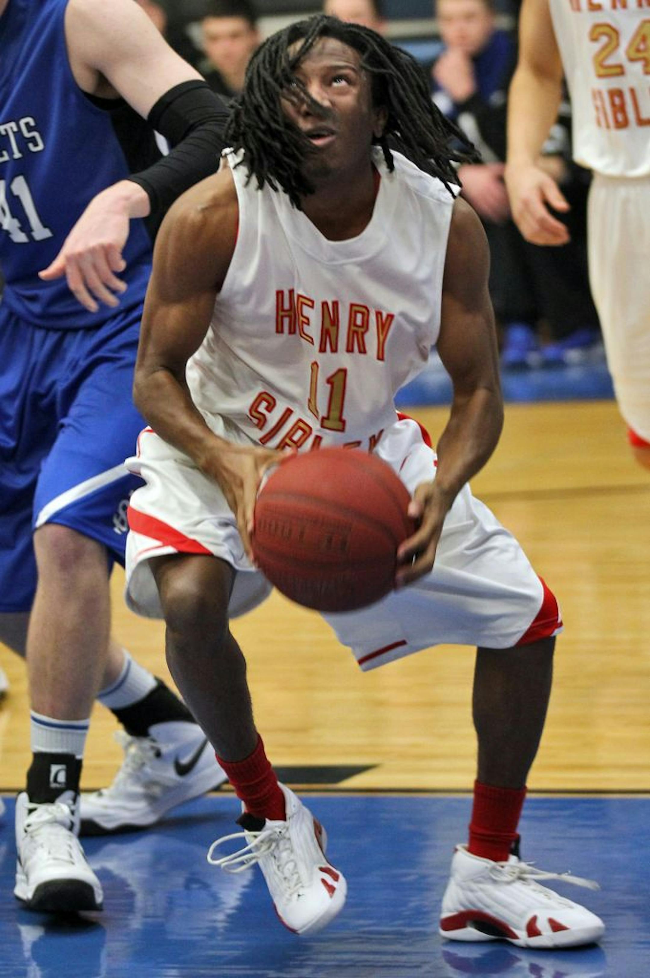 Henry Sibley point guard Julius Johnson went through some difficult times on the way to this season. Now the team is off to its best start in three years. Photo by Marlin Levison • mlevison@startribune.com