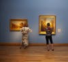 People view the Hudson River School collection at the Minnesota Marine Art Museum in Winona, Minnesota on Sept. 27, 2014. In addition to collections t