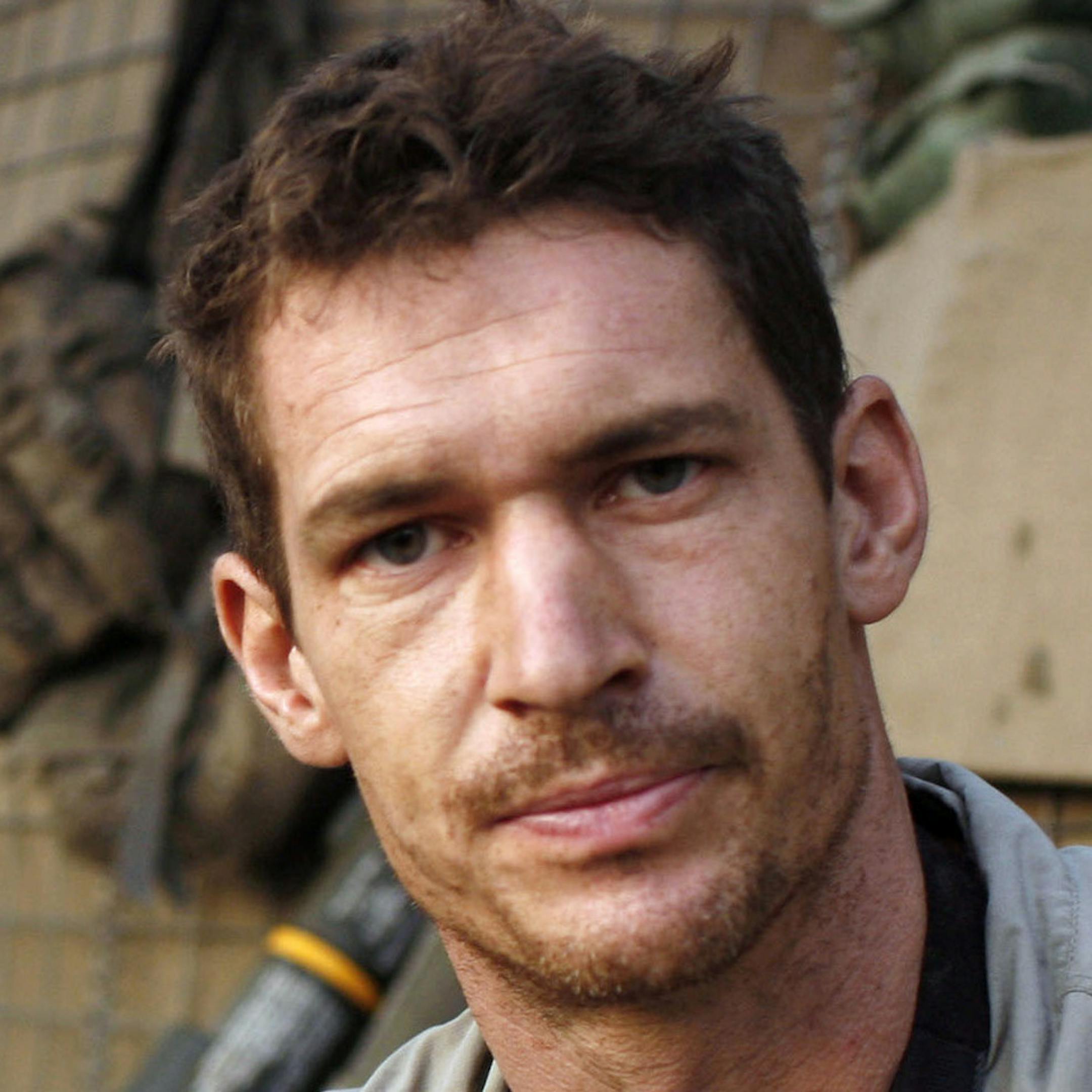 FILE -- Photojournalist and filmmaker Tim Hetherington in Afghanistan in an undated handout photo. Hetherington was killed in the besieged city of Misrata, Libya, on Wednesday, April 20, 2011, and three photographers working beside him were wounded, one critically. (Tim Hetherington/Outpost Films via The New York Times) -- MAGS OUT/NO SALES; FOR EDITORIAL USE ONLY WITH STORY SLUGGED LIBYA-JOURNALISTS BY C.J. CHIVERS. ALL OTHER USE PROHIBITED -- ORG XMIT: MIN2013040919070400