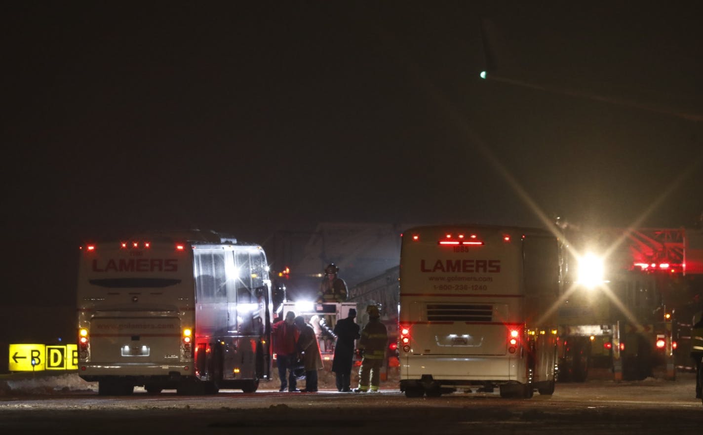 Busses awaited Vikings players before they deplaned from their chartered aircraft hours after landing at Appleton International Airport.