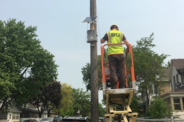 MPCA staff install air monitors