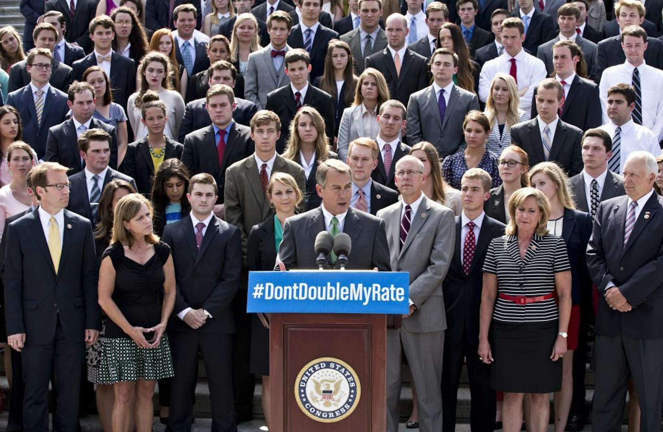 With a backdrop of college students on the step of the House of Representatives, Speaker of the House John Boehner, R-Ohio, and GOP leaders talk about the politics of federal student loan rates which doubled on July 1, at the Capitol in Washington, Monday, July 8, 2013.