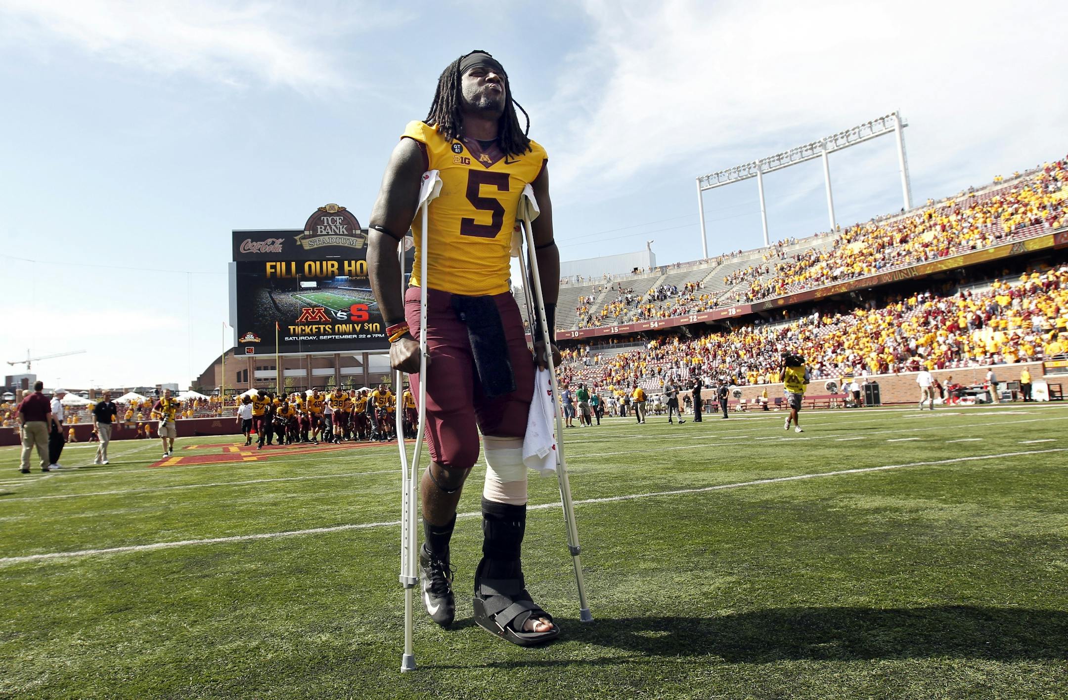 Minnesota quarterback MarQueis Gray walked off the field with crutches at the end of the game. Gray left the game in the second quarter with an injury.