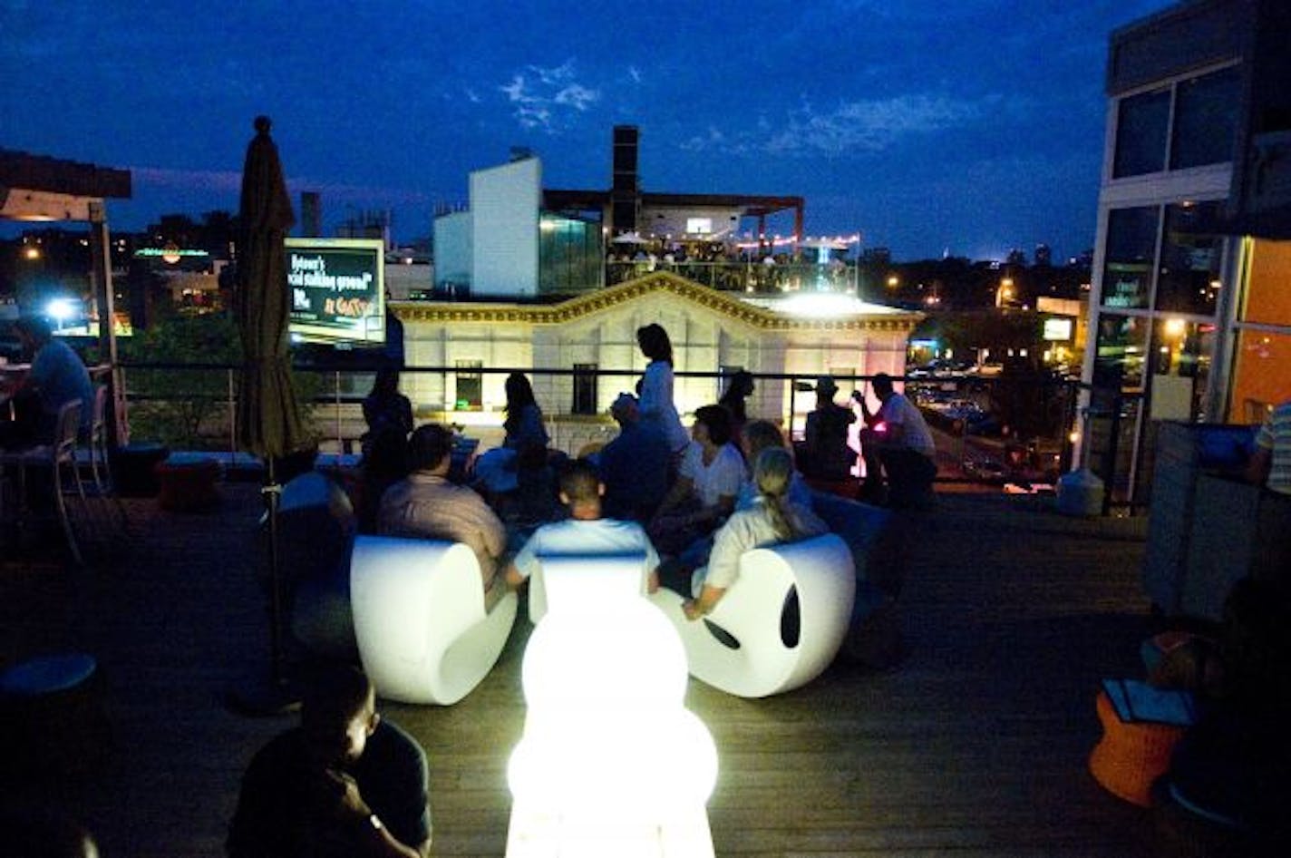 Rooftop customers took in the view on a recent Friday night from the Uptown Cafeteria's Sky Bar.