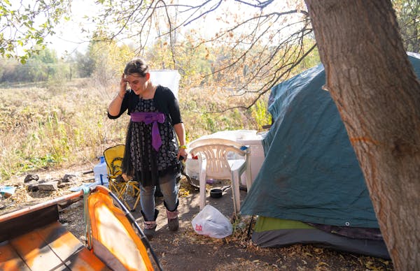 In Minneapolis and St. Paul, two homeless encampment strategies