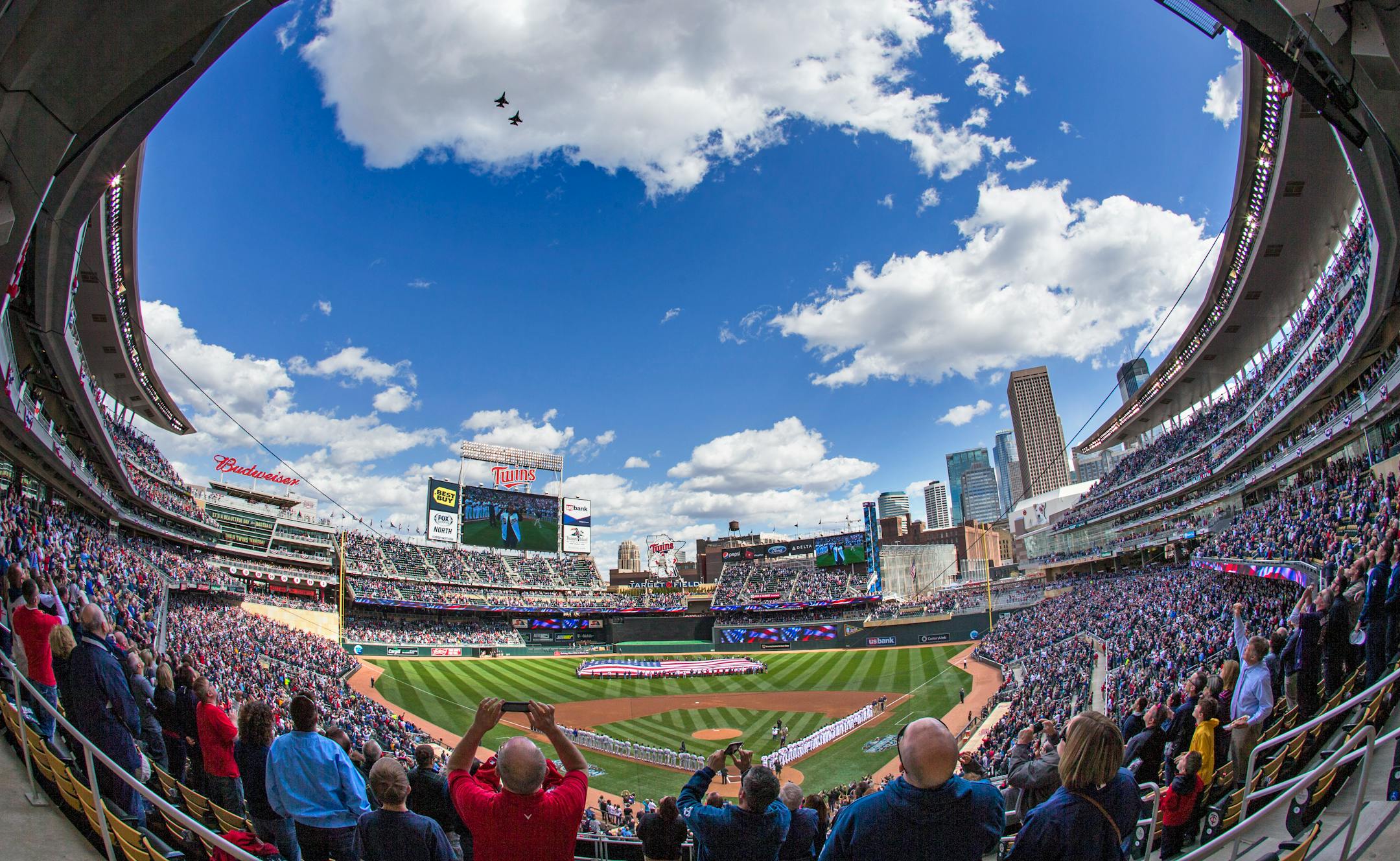 Two F16's from the Duluth based 148th Fighter WIng flew over Target Field before the start of the Twins Home Opener Monday afternoon. ] Minneapolis, MN - 4/13/2015