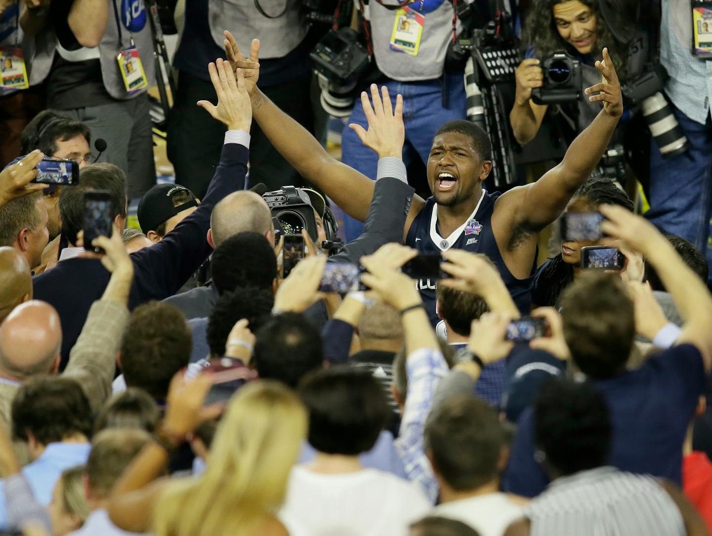 Villanova forward Kris Jenkins celebrated after his buzzer-beating three-pointer beat North Carolina 77-74 to win the NCAA college basketball championship Monday in Houston.