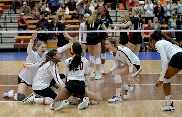 Minnesota players celebrated sweeping Louisville in the fourth round of the NCAA volleyball tournament on Saturday, Dec. 14, 2019, in Austin, Texas. (