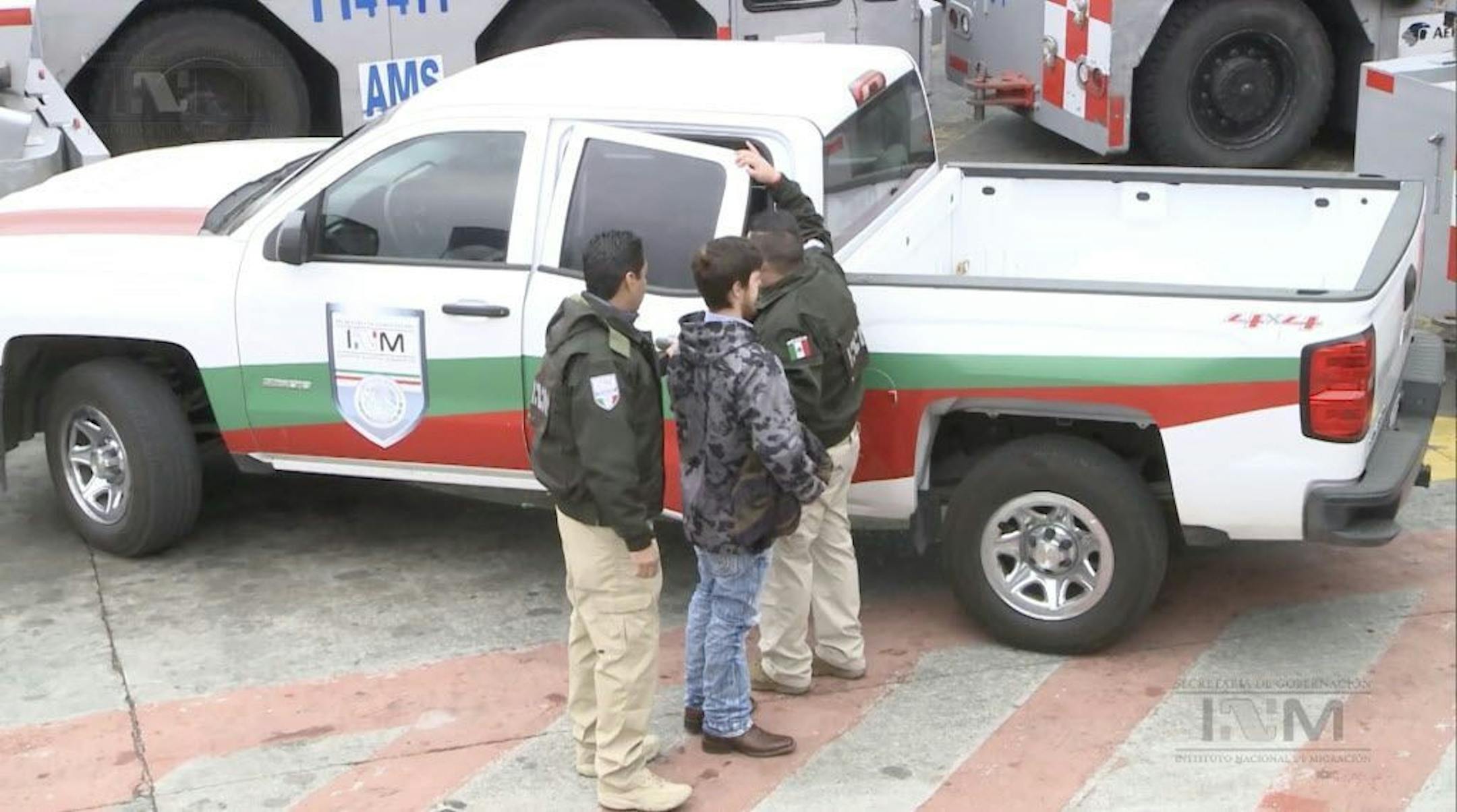 This frame grab taken from a Thursday, Jan. 28, 2016 video provided by Mexico's Instituto Nacional de Migracion, INM, shows Ethan Couch, as he is escorted by Mexican immigration agents, upon their arrival to the international airport in Mexico City. INM says it has taken the Texas teenager who used an "affluenza" defense in a fatal drunken-driving accident to the Mexico City airport, to fly him back to Texas to face charges. The institute said Thursday that Couch would be placed on a commercial