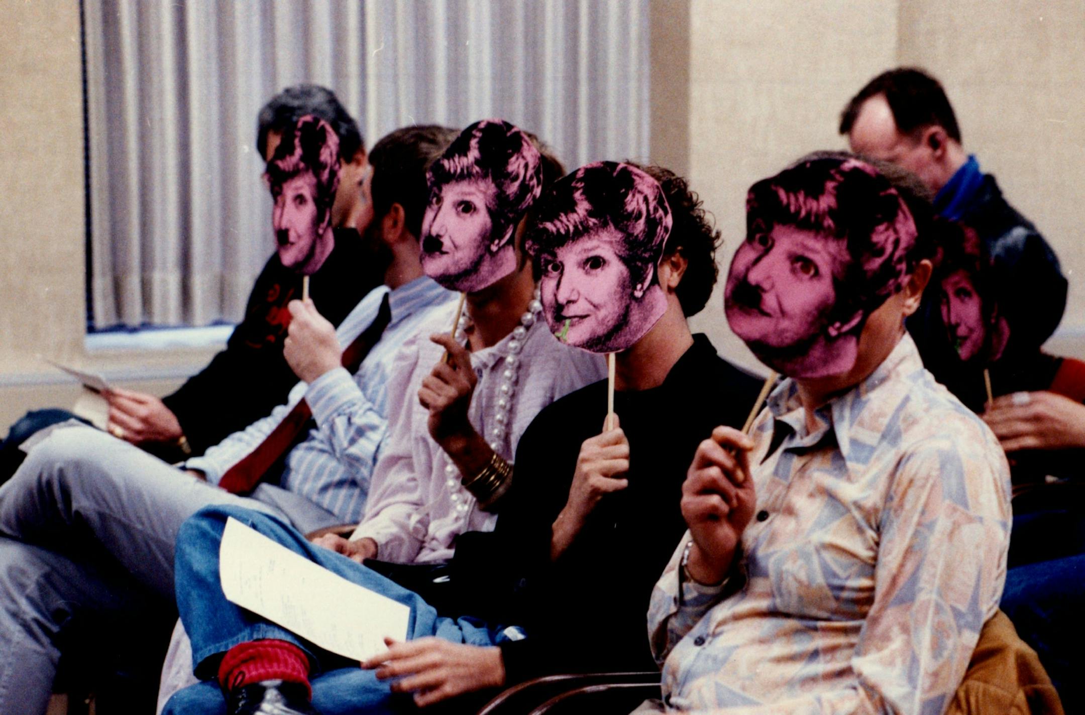 October 2, 1989 Mpls City Hall, room 319...city council public health and safety committee meeting, considering anti cruising ordinance...group in the audience here all covering their faces with Barbara Carlson masks the one in the middle was wearing a pink dress and a string of pearls... October 3, 1989 Don Black, Minneapolis Star Tribune