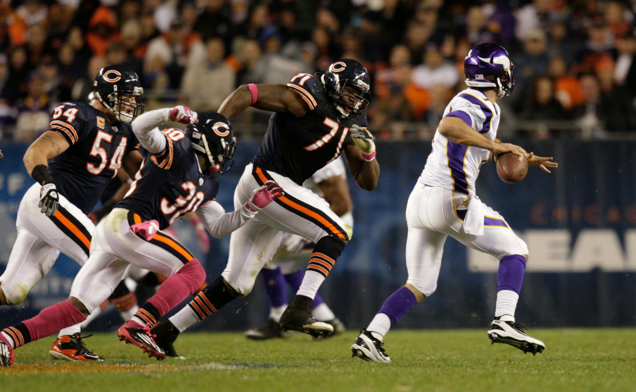 Vikings quarterback Christian Ponder (right)