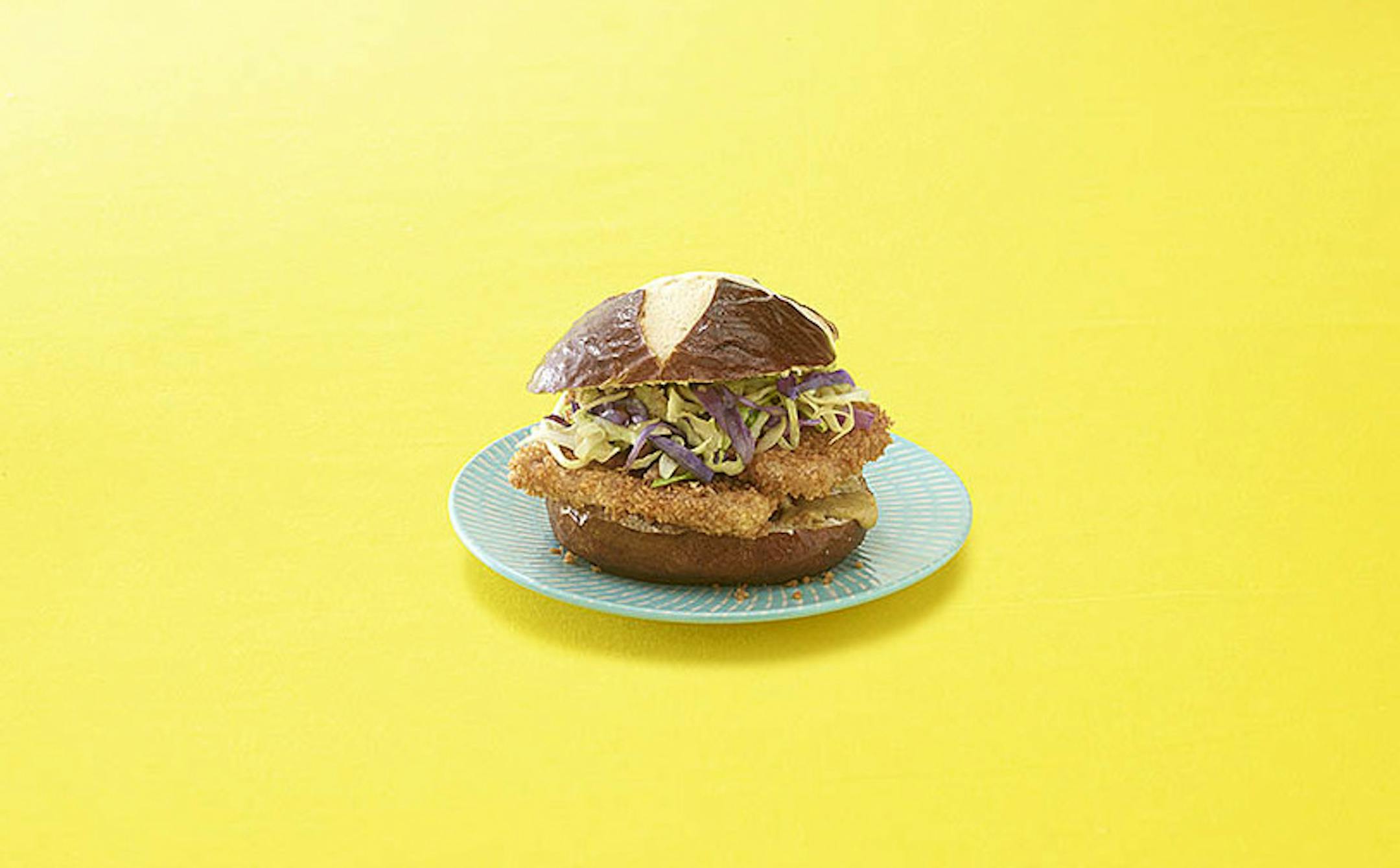A Wisconsin cook took top honors in the national Spam contest with her Gemutlichkeit Spamwich that features cabbage slaw on a pretzel bun.