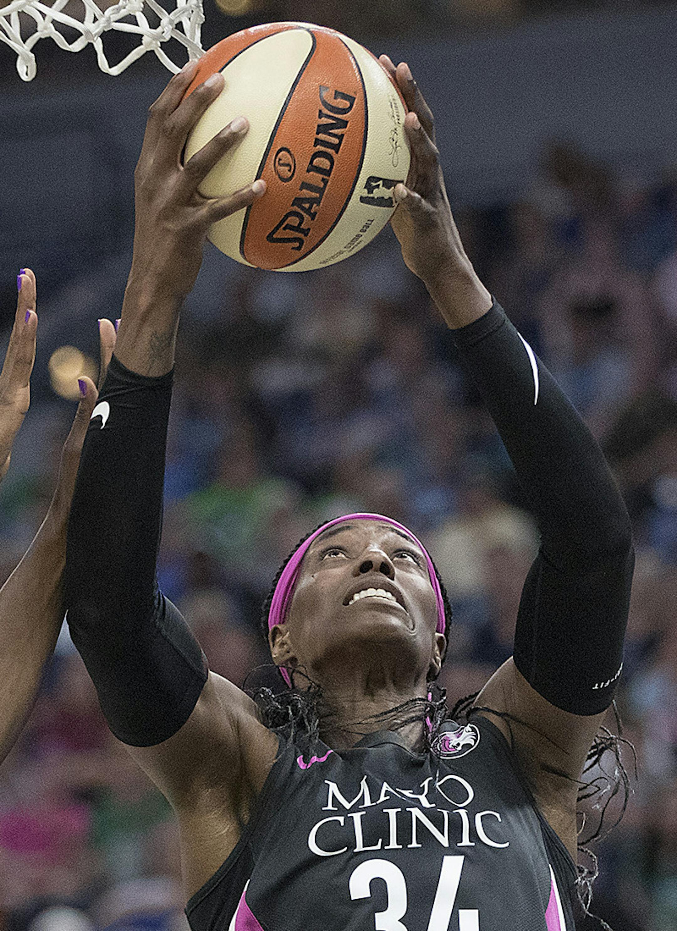 Minnesota Lynx center Sylvia Fowles took it to the net above Seattle Storm's forward Crystal Langhorne during the fourth period as the Minnesota Lynx took on the Seattle Storm, at Target Center, Sunday, August 12, 2018 in Minneapolis, MN. ] ELIZABETH FLORES ï liz.flores@startribune.com